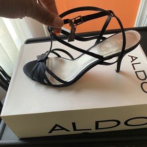 Black t strap heel. New.